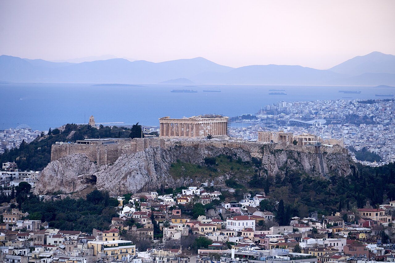 The Acropolis of Athens seen from Mount Lycabettus with the city sprawling around it