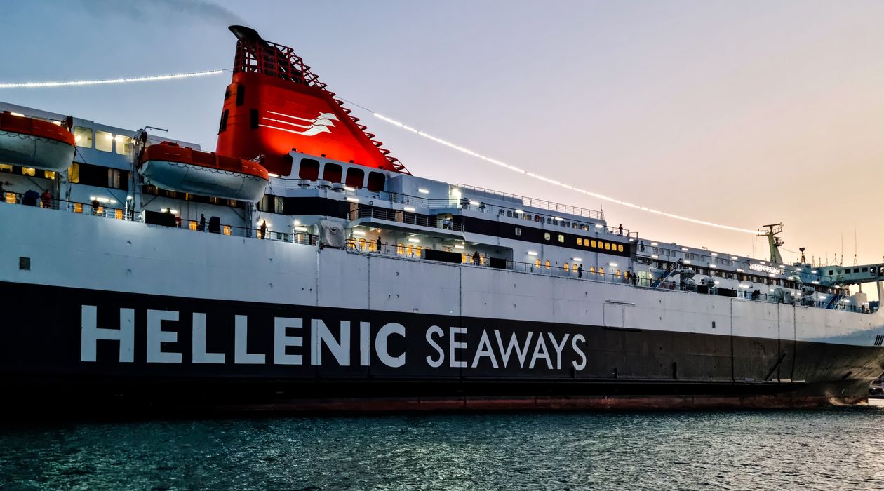 A Hellenic Seaways ferry sailing across the blue Aegean Sea in Greece